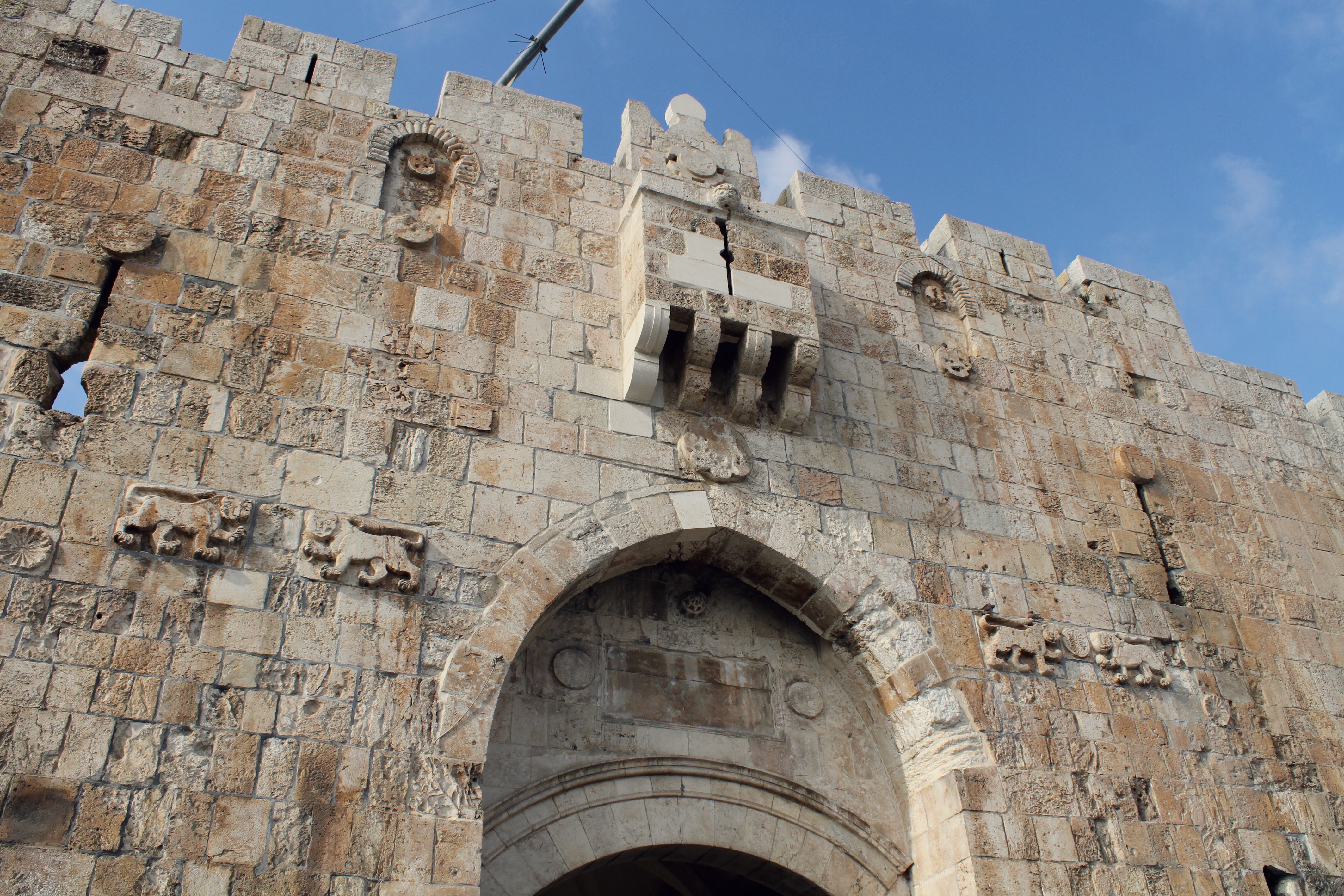 A photograph of the Lion's Gate leading into Jerusalem's Old City.