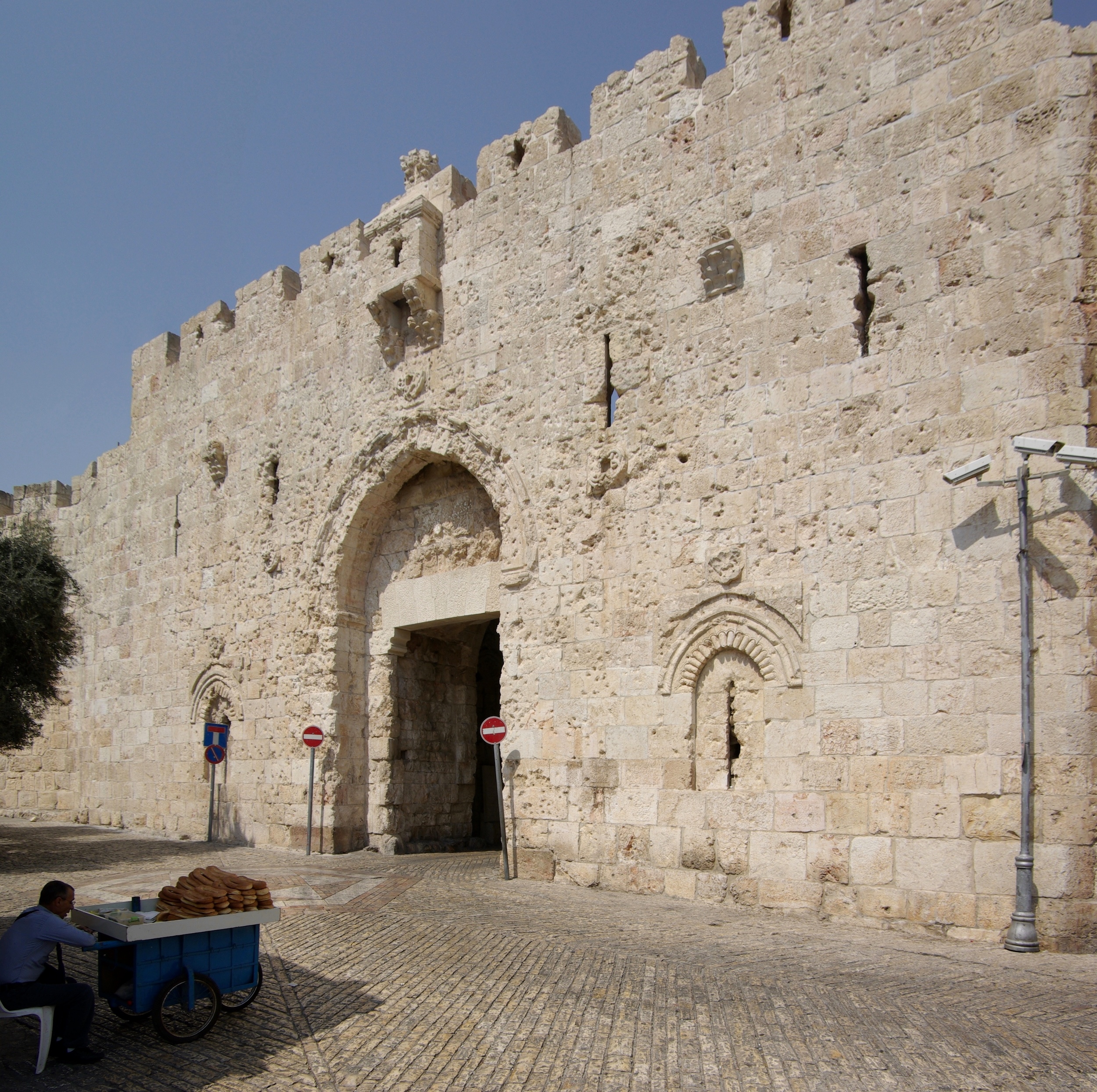 A beautiful picture of the Zion Gate against blue skies in Jerusalem.
